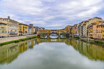 Ponte Vecchio (Old Bridge), a medieval stone bridge with shops on it, Florence, Italy