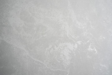 white marbeled stone background texture with soft gradient and copy space