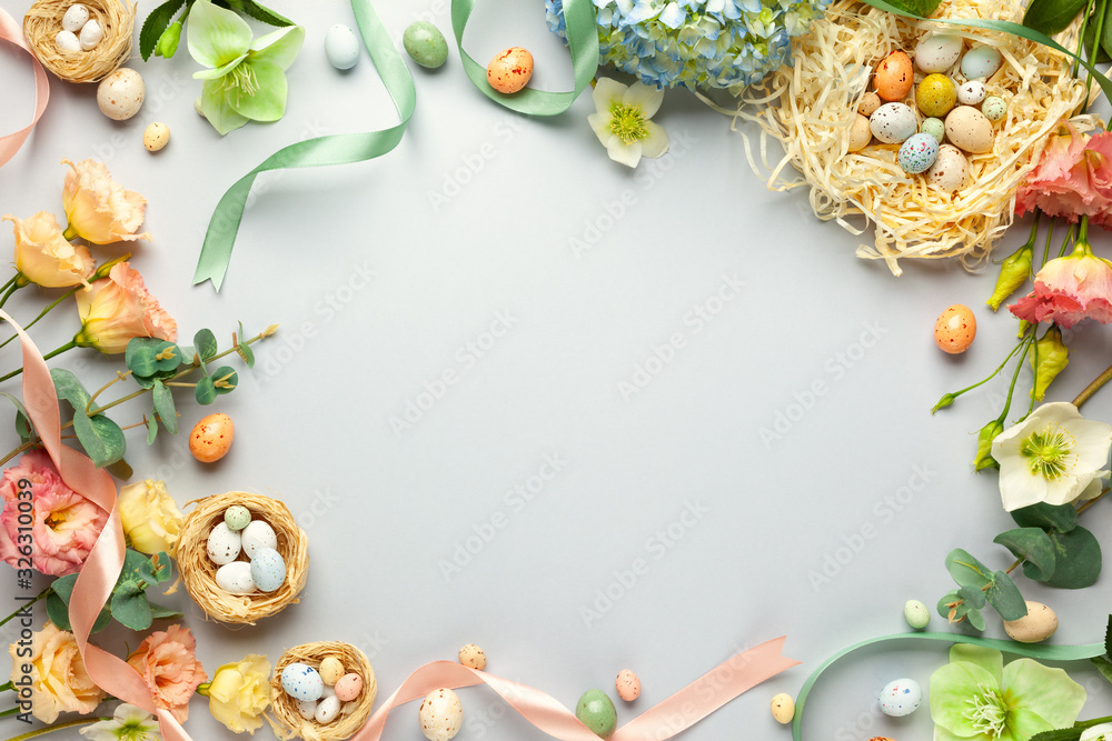 Wall mural happy easter concept with easter eggs in nest and spring flowers. easter background with copy space. - Wall murals