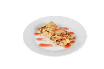 Pancake sweet stuffed with berry decoration, strawberry topping, on a plate isolated white background. Dessert for a menu in a cafe, restaurant, coffee shop side view