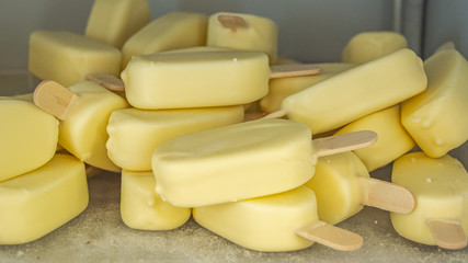 small mini vanilla ice creams with sticks