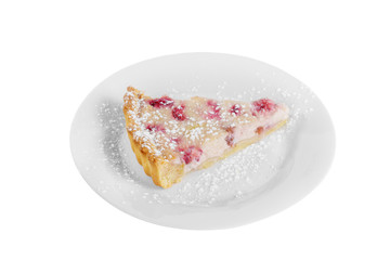 White cheesecake, berry pie on shortcrust pastry, with powdered sugar, on a plate isolated white background. Dessert for a menu in a cafe, restaurant, coffee shop side view