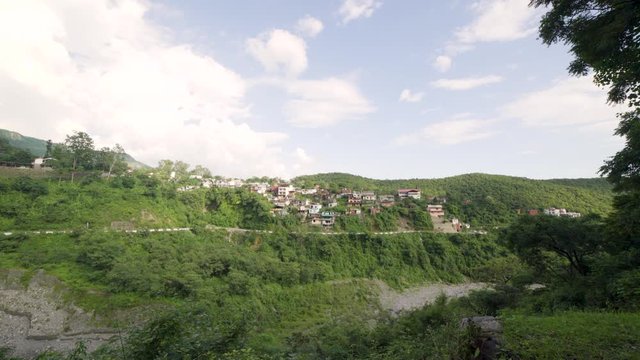 dehradun, uttarakhand / indian - September 25 2019 : vehicle running on india mountains roads towards pilgrims destinations ganotri, badrinath, kedarnath and yamnotri .   
