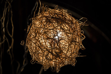 Vintage interior spherical lamp woven from rattan