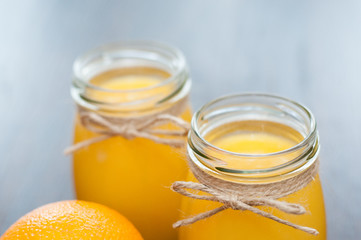 Rustic style orange juice side view