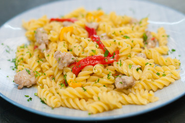 Italian pasta with meat, cheese, spices, parsley and red tomato sauce. Gourmet traditional food
