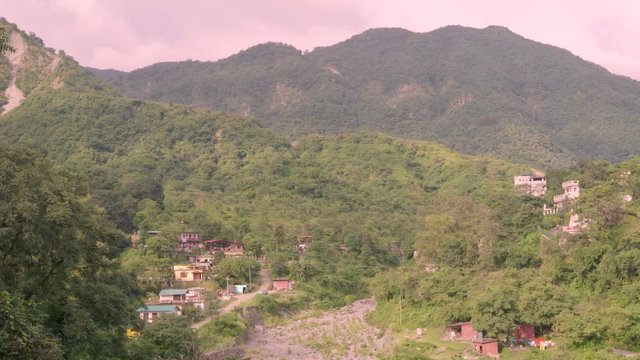 dehradun, uttarakhand / indian - September 25 2019 : vehicle running on india mountains roads towards pilgrims destinations ganotri, badrinath, kedarnath and yamnotri .   