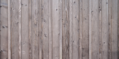 Gray wooden background with old rustic grey planks wood texture vertical painted boards wallpaper