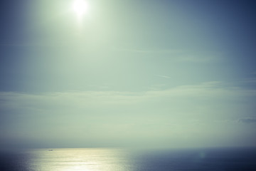 Fototapeta na wymiar Sea water and sky with sun