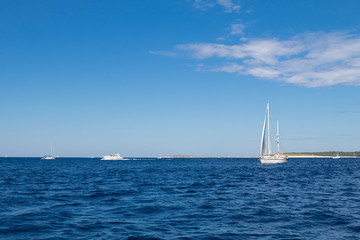 Obraz premium luxury big white sailing yachts at the sea 