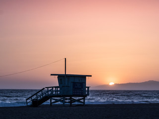 Sunset on the beach in California, Coast Guard rescue shed