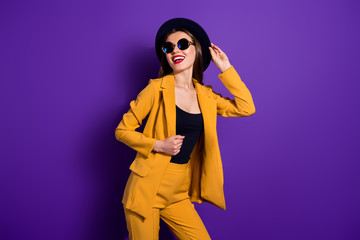 Portrait of cheerful lovely charming girl have free time enjoy her fall holidays touch retro hat...