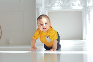 cheerful healthy baby smiling / portrait of a small child, boy little son cheerful health