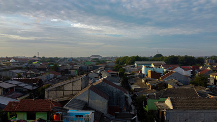 Fototapeta premium Aerial POV view Depiction of flooding. devastation wrought after massive natural disasters at Bekasi - Indonesia