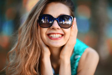 cheerful blonde in sunglasses / young beautiful girl, sunglasses, woman summer look