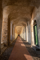 Archway in the old town of Imperia, Liguria region, Italy