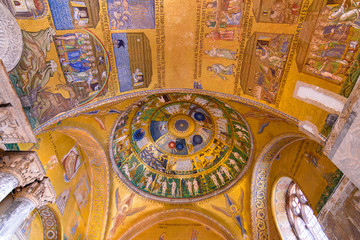 Fototapeta na wymiar The mosaic decoration art of the interior of St Mark's Basilica, the cathedral church of Venice, Italy