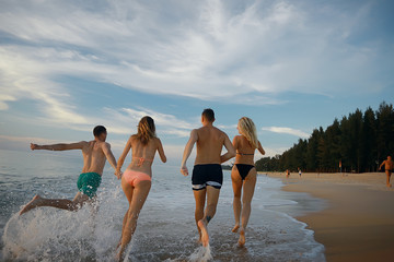 loving couple on the beach / summer vacation, sea coast, love, romantic vacation at sea