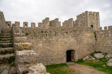 Fototapeta na wymiar Ruins of the Sesimbra castle fort walls in Portugal