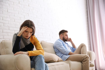 Obraz premium Unhappy couple with problems in relationship at home