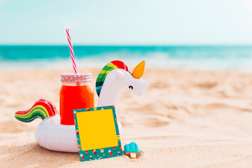 summer composition with unicorn inflatable