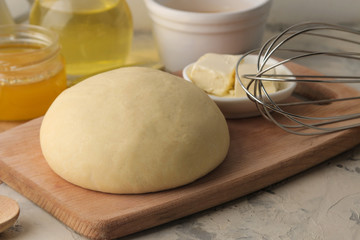 Dough for baking. making delicious cookies. Ingredients for the dough, eggs, flour, butter, sugar on a light background.