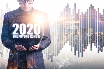 The abstract image of businessman using a smartphone overlay with 5g and cityscape hologram and and element of this image furnished by Nasa. the concept of 5G, communication and internet of things.