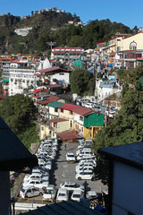 Fototapeta na wymiar Aerial view of village and car parking in the morning, Mussoorie, Uttarakhand, India