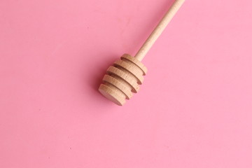 honey stick in color background