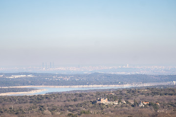Panoramic view of Madrid (Spain) and pollution cloud from the distance