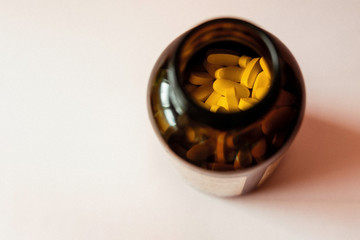 vitamins pills in a glass jar