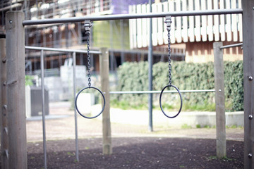 Fototapeta na wymiar Metal rings hanging on the children's playground