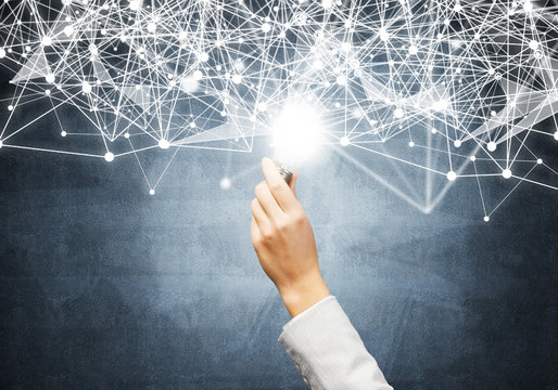 Human hand with glowing lamp and abstract network