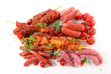assorted of raw meats- sausage, skewer, chorizo, beef, chicken