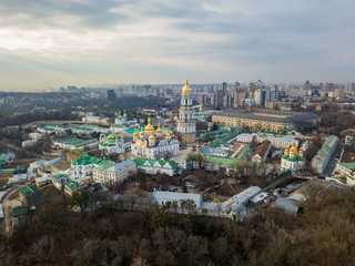 Naklejka premium Aerial drone view. Kiev-Pechersk Lavra on a cloudy spring day.