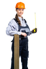 Girl builder with a tape measure in hands and a wooden board. isolated