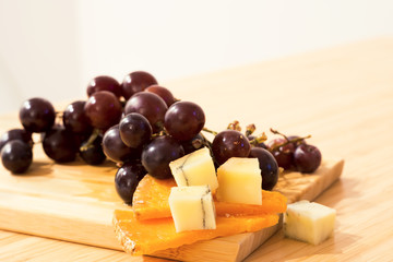 Still life with grape Muskat, french cheese