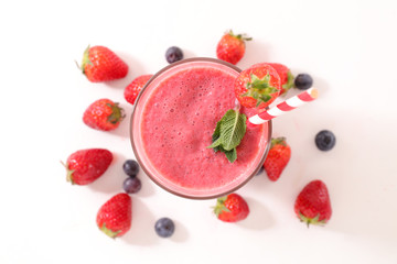 berry fruit smoothie- strawberry and blueberry smoothie on white background