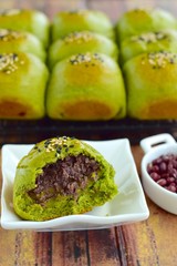 Matcha green tea bread buns filled with Adzuki red bean paste