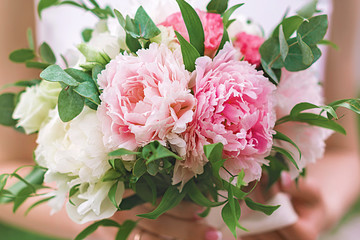Beautiful Bridal bouquet of peonies hands wedding