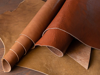 Genuine Leather. Sewing a purse. Leather work. Tools for sewing bags, wallets, clutches. Stitching....