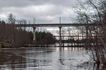 View of the bridges across the Saimaa Canal on a cloudy spring day.