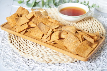 Fototapeta na wymiar A snack similar to chips. It's called millet crisp crust