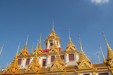 Fototapeta premium The place named Loha Prasat in Wat Ratchanatdaram in Bangkok Thailand which means iron castle or monastery that the center tower contained large black iron spires.