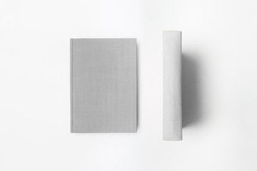 Vertically standing blank white Books Mock up on a white background.High resolution photo.