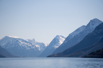 Fototapeta na wymiar Layers with mountains in Norwegian fjord