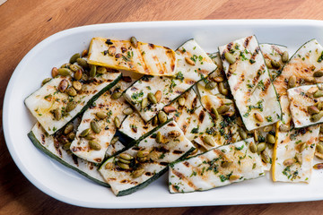 Grilled vegetables. Farm fresh organic veggies, squash, zucchini, red bell peppers, purple onions grilled with olive oil and seasoned with salt and pepper, a classic restaurant favorite side dish
