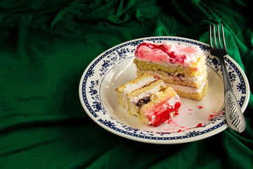 Homemade puff cake, cake in a plate, sponge cake.