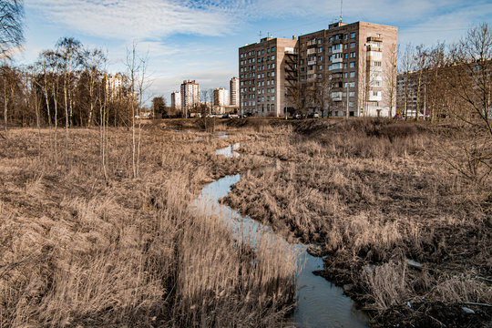 Urban Landscape With Dirty Stream