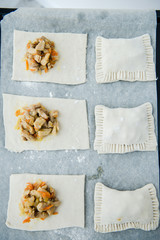 Raw dough with filling. Chicken pie. Dough preparation. Cooking process 